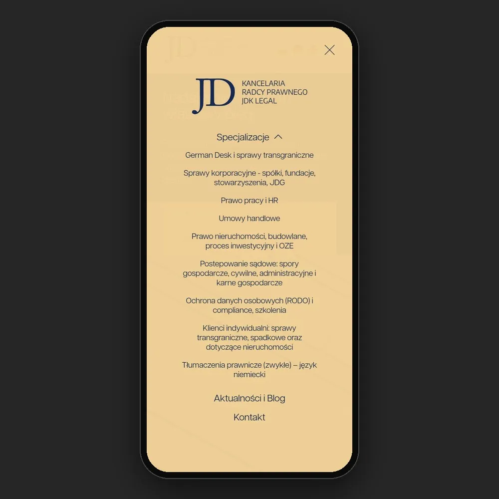 Menu strony JDK Legal z rozwiniętą listą specjalizacji na telefonie